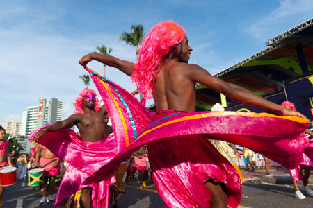 Salvador, Bahia, Brazil - February 03, 2024: People who are members of cultural groups are seen parading during Fuzue, pre-carnival in the city of Salvador, Bahia.のeditorial素材