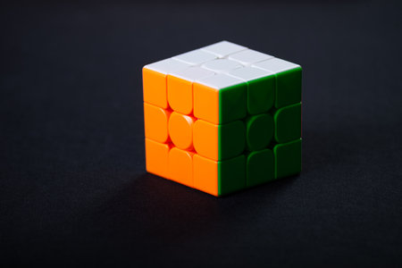 Salvador, Bahia, Brazil - May 15, 2024: Rubiks Cube on a black background. This famous cube puzzle was invented by architect Erno Rubik in 1974のeditorial素材