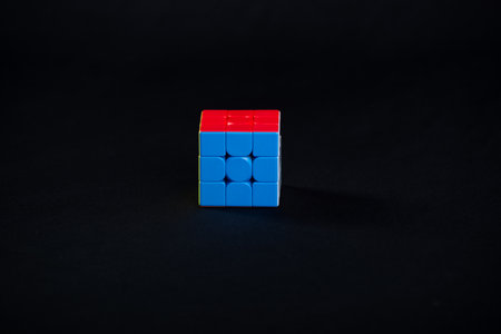 Salvador, Bahia, Brazil - May 15, 2024: Classic 3x3x3 Rubiks Cube on a black background. Rubiks Cube invented by Hungarian architect Erno Rubik in 1974.のeditorial素材