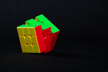 Salvador, Bahia, Brazil - May 15, 2024: Rubiks Cube on a black background. This famous cube puzzle was invented by architect Erno Rubik in 1974のeditorial素材