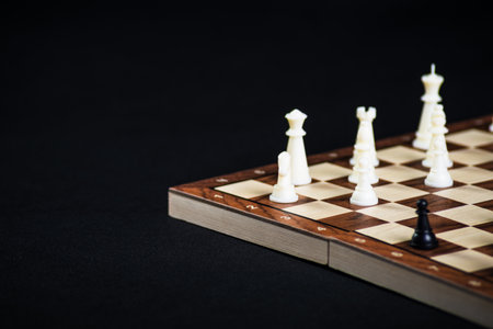 Chess board with pieces. Game concepts. Board game. Hobby. Game on black background.の写真素材