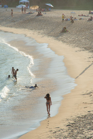 Salvador, Bahia, Brazil - July 06, 2019: People are seen on Paciencia beach having fun and sunbathing in the city of Salvador, Bahia.のeditorial素材