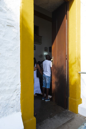 Salvador, Bahia, Brazil - August 16, 2019: Catholic faithful are seen attending masses inside the church during a tribute to Saint Roque in the city of Salvador, Bahia.のeditorial素材
