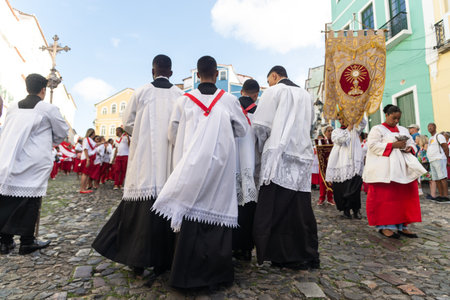 Salvador, Bahia, Brazil - July 27, 2024: Catholic faithful are seen praying and singing in the procession of the Sacred Heart of Jesus through the streets of Pelourinho, in Bahia.のeditorial素材