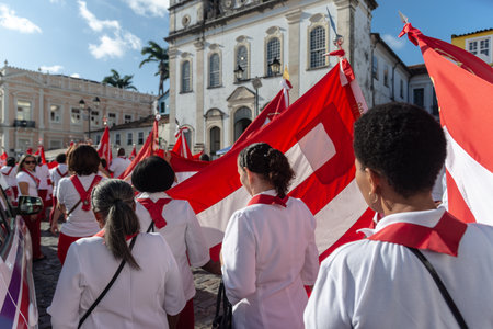 Salvador, Bahia, Brazil - July 27, 2024: Several people are seen following the Catholic procession of the Sacred Heart of Jesus in Pelourinho. City of Salvador, Bahia.のeditorial素材