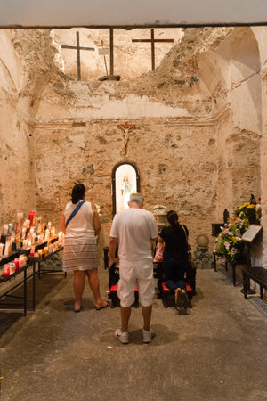 Salvador, Bahia, Brazil - December 08, 2019: Catholic faithful are seen praying inside the Conceicao da Praia church in the city of Salvador, Bahia.のeditorial素材