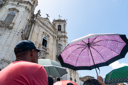 Salvador, Bahia, Brazil - December 08, 2019: Catholic faithful are seen participating in the open-air mass at the Conceicao da Praia church in the city of Salvador, Bahia.のeditorial素材