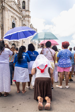 Salvador, Bahia, Brazil - December 08, 2019: Hundreds of Catholics are seen attending an open-air mass at the Conceicao da Praia church in the city of Salvador, Brazil.のeditorial素材
