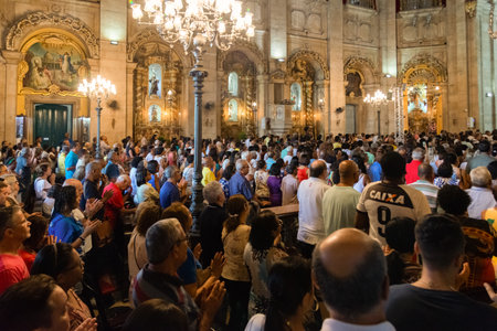 Salvador, Bahia, Brazil - December 08, 2019: Catholic faithful are seen praying inside the Conceicao da Praia church in the city of Salvador, Bahia.のeditorial素材