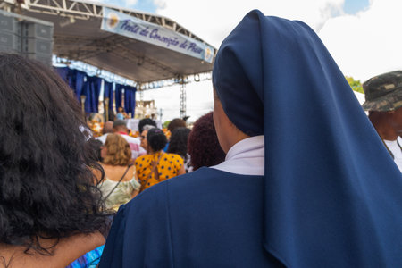 Salvador, Bahia, Brazil - December 08, 2019: Hundreds of Catholics are seen attending an open-air mass at the Conceicao da Praia church in the city of Salvador, Brazil.のeditorial素材