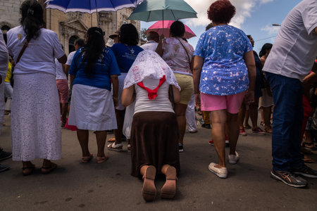 Salvador, Bahia, Brazil - December 08, 2019: Catholic faithful are seen participating in the open-air mass at the Conceicao da Praia church in the city of Salvador, Bahia.のeditorial素材