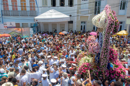 Salvador, Bahia, Brazil - December 08, 2019: A crowd of Catholics is seen participating in the procession during the celebration of the Conceicao da Praia church in the city of Salvador, Bahia.のeditorial素材
