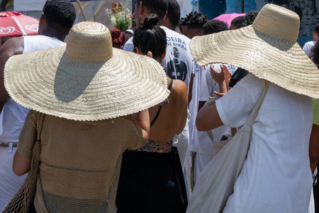 Salvador, Bahia, Brazil - December 08, 2019: Catholic faithful are seen participating in the open-air mass at the Conceicao da Praia church in the city of Salvador, Bahia.のeditorial素材