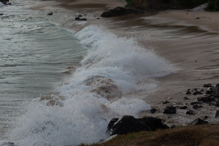 Strong sea waves breaking on the beach sand. Live nature. Environment. Brazil.の写真素材