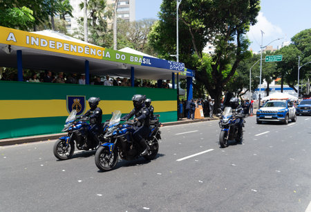Salvador, Bahia, Brazil - September 07, 2024: Municipal guard police officers are seen stopping on motorcycles on Brazilian Independence Day. City of Salvador, Bahia.のeditorial素材
