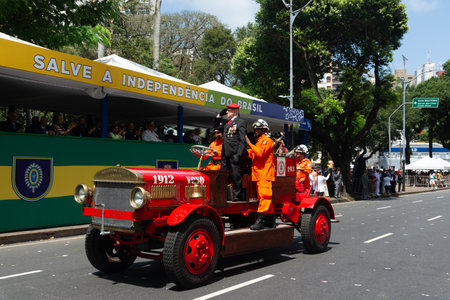 Salvador, Bahia, Brazil - September 07, 2024: Military personnel are seen parading in an old fire department vehicle on Brazilian Independence Day in the city of Salvador, Bahia.のeditorial素材