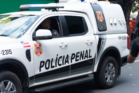 Salvador, Bahia, Brazil - September 07, 2024: A white Bahia Penal Police car is seen during the Brazilian Independence Day parade in the city of Salvador.のeditorial素材