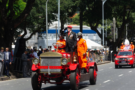 Salvador, Bahia, Brazil - September 07, 2024: Military personnel are seen parading in an old fire department vehicle on Brazilian Independence Day in the city of Salvador, Bahia.のeditorial素材