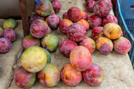 Mangoes for sale at a market. Tropical, juicy, aromatic and nutritious fruit rich in vitamins,...