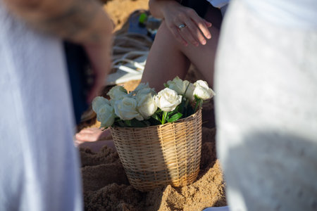 People are seen bringing flowers and gifts to Iemanja on Rio Vermelho beach in Salvador, Brazil.の写真素材