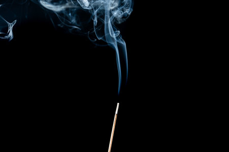 The shape of the smoke is constantly changing. black backgroundの写真素材