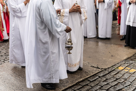 Catholic priests are seen taking part in the Palm Sunday procession. Salvador, Brazil