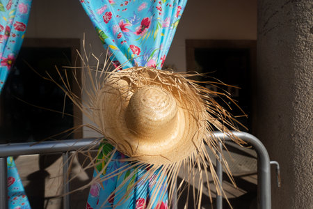 Straw hat attached to colored cloth as decoration. Feast of Saint John. Pelourinho, Brazil.の写真素材