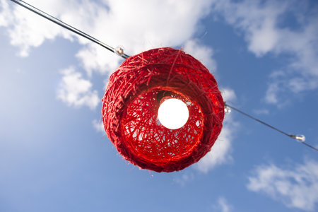 Red decoration with a light bulb inside for the feast of Saint John. Pelourinho, Brazil.の写真素材