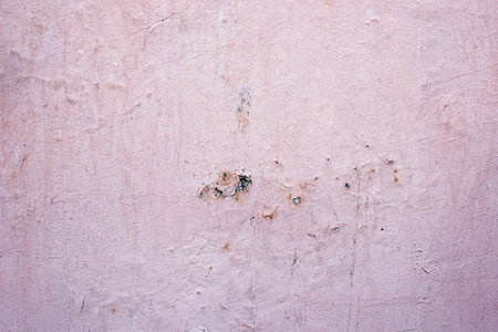Texture of an old and dirty light pink wall. Background for work. copy, space, abstract.の写真素材