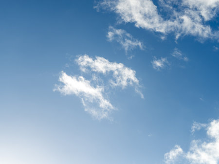 White clouds in the blue sky. Space. Background. Backdrop.の写真素材