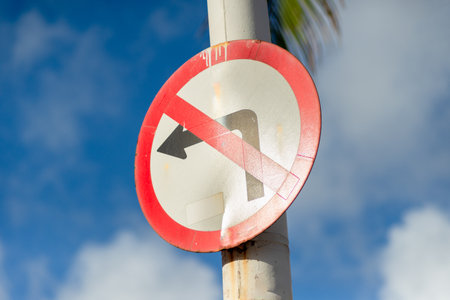 Traffic sign indicating that it is prohibited to turn left. Transport signage. public road