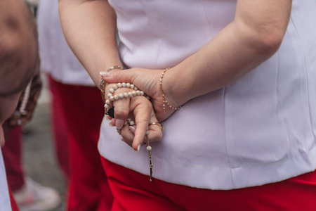Details of hands of religious person holding crucifix. Salvador, Brazilの写真素材