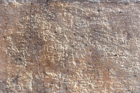 Light texture of a wall. Grainy and rough. Background for projects. Abstract