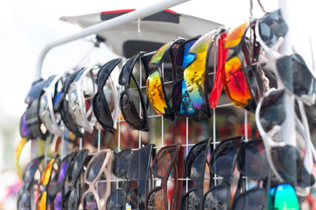 Salvador, Bahia, Brazil - December 8, 2025: Close-up of a row of sunglasses for sale on a street in Salvador, Bahia.のeditorial素材