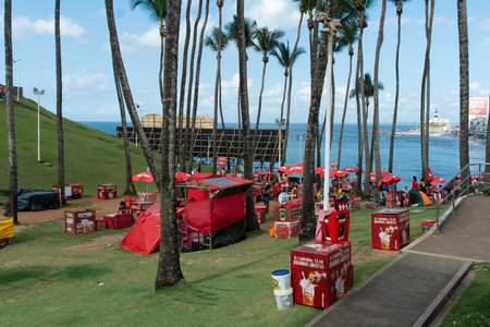 Salvador, Bahia, Brazil - February 7, 2026: Panorama of Morro do Cristo in Salvador with street vendors positioned at the base and tourists at the top under palm trees. Brazilのeditorial素材
