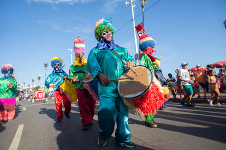 Salvador, Bahia, Brazil - February 8, 2026: The Zambiapunga group, dressed in vibrant colors and...