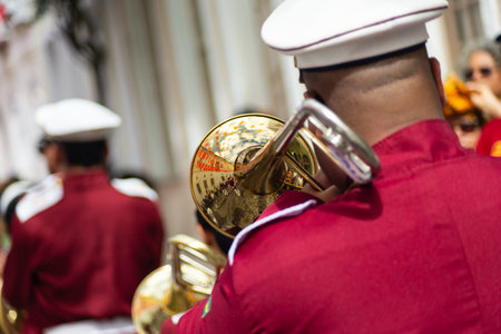 Salvador, Bahia, Brazil - July 2, 2026: Members of a public school marching band are seen playing in the streets of Carmo during the July 2nd celebrations in Salvador, Bahia.