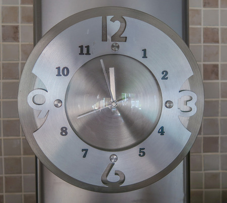 Silver Kitchen Clock mounted on Wall