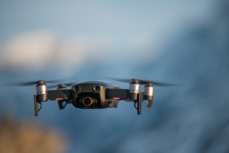 Drone in flight at a mountain