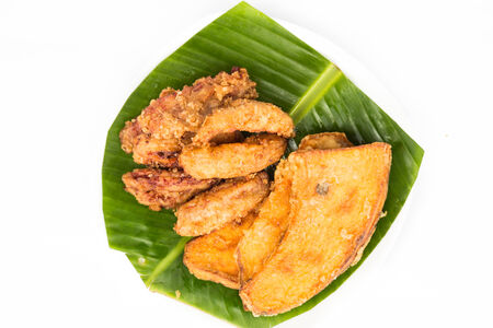 A serving consisting of the combination of fried banana and fried sweet potatoes, a popular snack in Malaysia.の写真素材