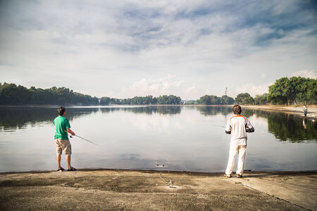 Recreational fishing at a lakeの写真素材