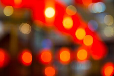 Blurry and Bokeh Background consisting red lanterns and lightsの写真素材