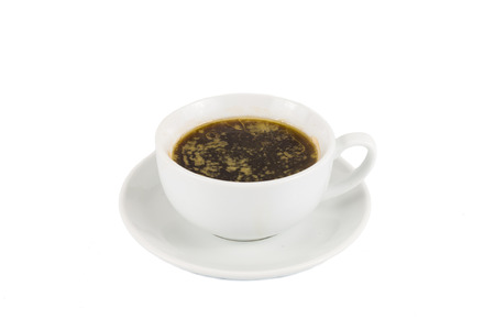 Black coffee with added butterの写真素材