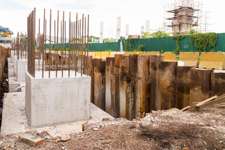 Foundation pillar and beam being constructed at construction siteの写真素材