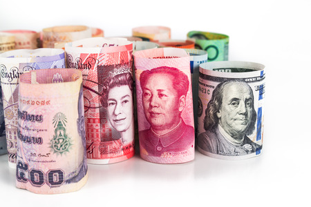 Close up on major currency note that is rolled-up.の写真素材