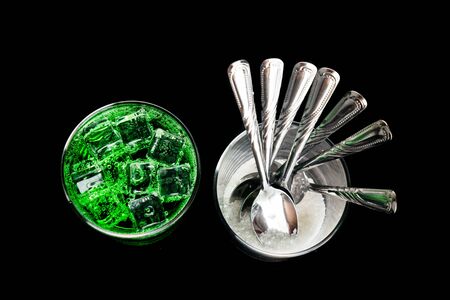 Concept of green fizzy drinks with unhealthy sugar content.の写真素材
