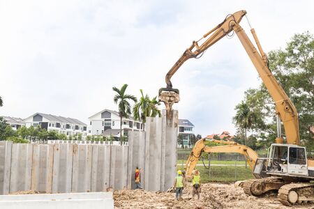Crane lifted and placed concrete bars into position at a construction site