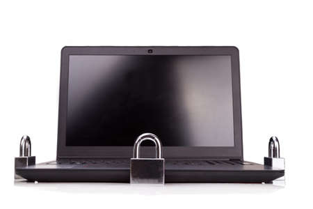Concept of computer security with padlock as shield over laptop in white background