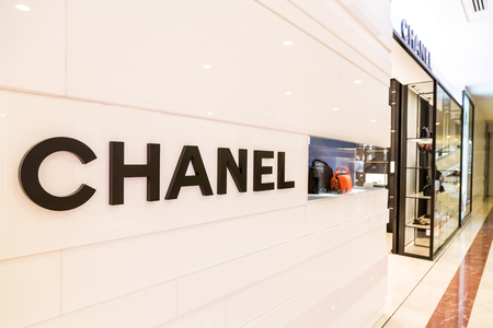 KUALA LUMPUR, MALAYSIA, May 20, 2016: CHANEL signage at its outlet at KLCC, Kuala Lumpur. CHANEL operates some 310 Chanel boutiques worldwide. "Coco" Chanel was founded in 1909 in Paris, France.のeditorial素材