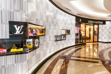 KUALA LUMPUR, MALAYSIA, May 20, 2016: A Louis Vuitton LV outlet in KLCC, Kuala Lumpur., with selective focus on the LV signage.  The Louis Vuitton company operates with more than 460 stores worldwide.のeditorial素材